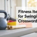 fitness items for swinging crossword clue